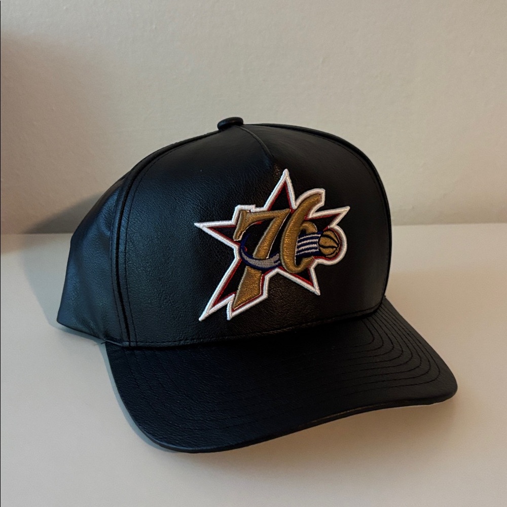 Mitchell & Ness Black Cap with Gold 76ers Logo
